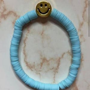 Light Blue Clay Bead Smiley face bracelet